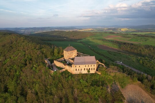Tocnik Castle ruins (Hrad Tocnik),aerial panorama landscape view of old castle standing on top of a mountain in Bohemia,Zebrak close to Prague,Czech republic,Europe
