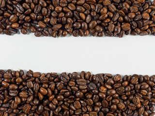 Arabica coffee beans roasted fragrant ready to make coffee that people like to drink placed on the white background looks beautiful