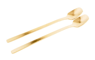 Golden spoons on white background