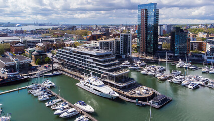 Ocean Village Marina is a redevelopped neighborhood of Southampton on the Channel coast in southern England, UK. It has a residential tower and a luxury hotel that mimics the shape of a cruise ship.