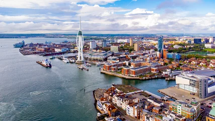 Foto op Plexiglas Aerial view of the sail-shaped Spinnaker Tower in Portsmouth Harbor in the south of England on the Channel coast - Gunwharf Quays modern shopping mall in a residential waterfront area © Alexandre ROSA