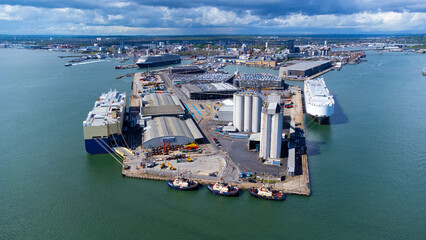 Ro-Ro ships unloading new cars in the Port of Southampton on the Channel coast in southern England,...