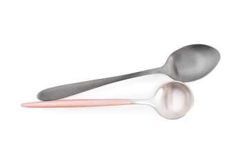 Stainless steel spoons on white background