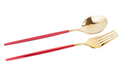 Golden spoon and fork with red handles on white background