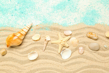 Sand with blue sea salt, seashells and starfishes on white background