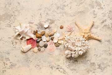 Seashells with coral and starfishes on grunge background
