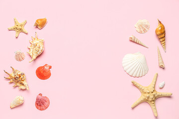 Frame made of seashells and starfishes on pink background