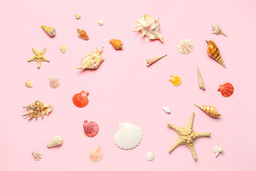 Frame made of seashells and starfishes on pink background