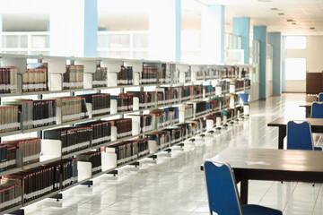 Row of bookshelves at school library