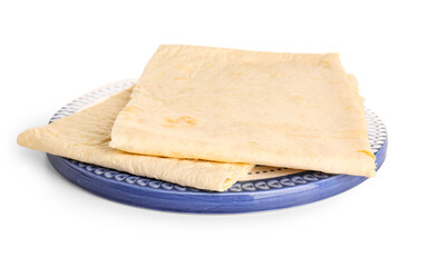 Plate with fresh thin lavash on white background