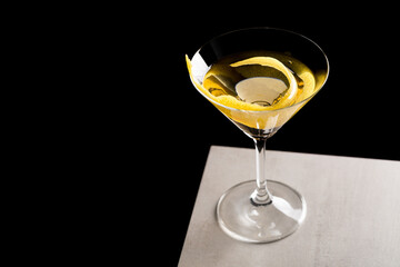 Martini Cocktail boozy gin, Italian vermouth, orange bitters and a twist of lemon peel