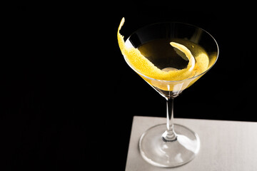 Martini Cocktail boozy gin, Italian vermouth, orange bitters and a twist of lemon peel