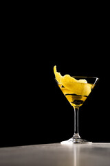 Martini Cocktail boozy gin, Italian vermouth, orange bitters and a twist of lemon peel