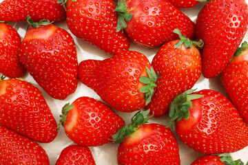 Fresh strawberries as background, closeup