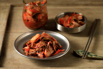 Napa Cabbage Kimchi on Small Korean Side Dish Plate.