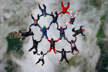 Skydiver beautiful teamwork formation - 601232227