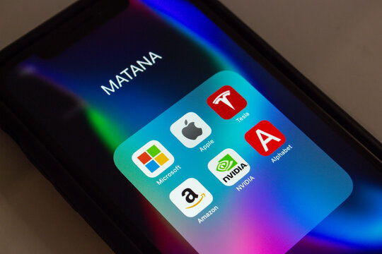 Vancouver, CANADA - May 7 2023 : MATANA (Microsoft, Apple, Tesla, Alphabet Inc, Nvidia, and Amazon) icons seen in an iPhone. An undated version of FAANG, GAFA or MAMAA. New big tech companies concept