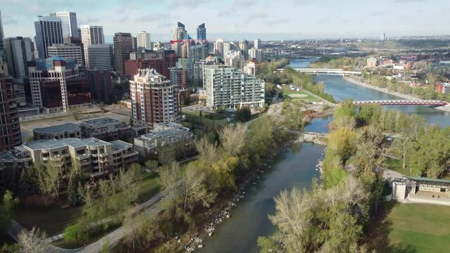 Aerial view of Calgary's skyline along Prince's Island Park and the Bow River.