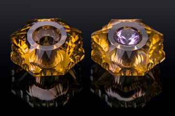 Author's cut of precious jewelry stones citrines on an isolated background unique products