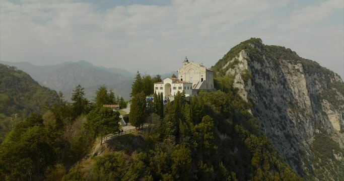 Montecastello shrine of Tignale on Lake Garda. Aerial drone descending 