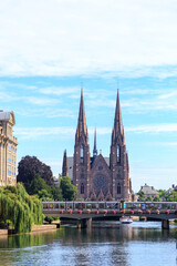 Fototapeta na wymiar Strasbourg, France - July 5, 2019: St. Paul's Church. Ile River