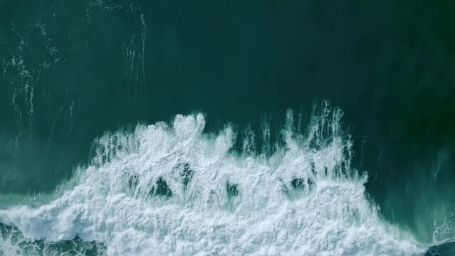 White Waves In The Deep Blue Ocean In Nazare, Portugal. - aerial