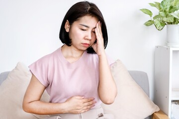 The Gut-Brain Connection with An Asian Woman's Struggle with Stomach Stress, emotional and stomach...