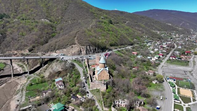 Aerial View Of Ananuri Church And Castle Complex On The Aragvi River In Georgia - drone shot