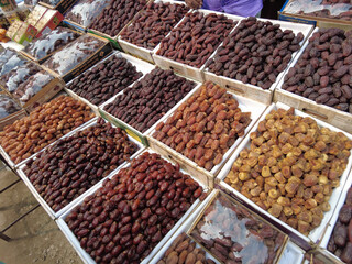  many date fruits display for sale at local market 