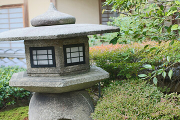  Stone lantern in Japanese Garden in autumn, Kyoto, Japan