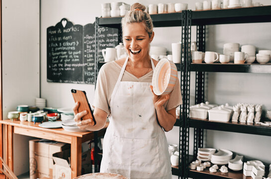 Happy woman, pottery and selfie in small business for social media, advertising or vlog at store. Female person or retail owner smiling with clay bowl for photo or online post on mobile smartphone