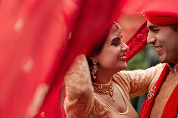 Celebration, young Indian married couple and dancing happy together. Happiness or commitment, love...
