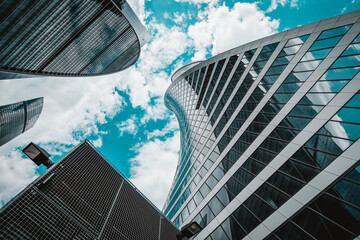 Towers of the business center "Moscow City" Empire and Evolution on the background of the sky with clouds.