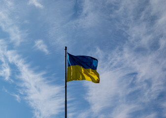 Ukrainian National Flag. The Dream of Happy Ukraine. The Flag of Ukraine is Blown by the Wind.