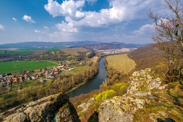 View with river at sunset in mountain. Spring landscape in Slovakia, Hron river. Spring walks in nature, healthy lifestyle
