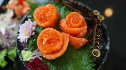 Salmon Sushi Japanese food. on the table in restaurant. Japanese cuisine set of Sashimi Salmon sushi nigiri. 