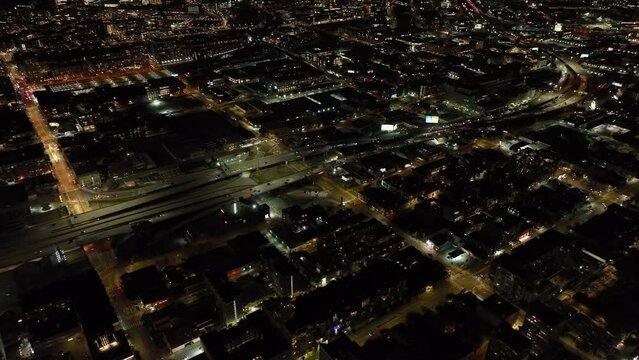 Night angle view of traffic on multilane trunk road leading through urban borough at night. San Francisco, California, USA