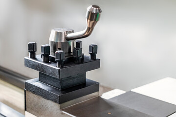 Close-up of lathe controls. Processing of metal products on a modern machine. Industrial processing of metal products with a cutting tool on an automatic lathe.