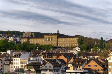 Fototapeta na wymiar Scenic view of the old town of Zürich with University building of Swiss Federal Institute of Technology on cloudy spring evening. Photo taken May 6th, 2023, Zurich, Switzerland.