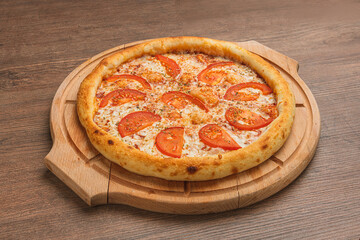Fresh classic pizza with tomato sauce, mozzarella, spicy chorizo, bell pepper on a wooden background
