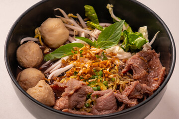 Thai noodle with pork is a street food that is commonly sold in Thailand. Also known as 