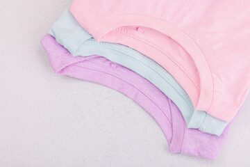 Eco friendly spring closet cleaning, capsules for machine washing. Pastel T-shirts, sale concept