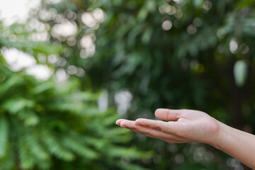 Technology, hand holding with environment Icons over the Network connection on green background.