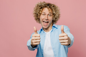 Young satisfied happy fun cheerful smiling caucasian cool blond man wear blue shirt white t-shirt...