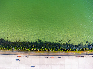 Aerial view landscape Poland Gdynia, city boulevard , drone photo, Baltic sea, concrete promenade, rocky coast.