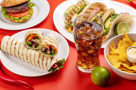 Mexican food featuring tacos, burritos, nachos, burgers