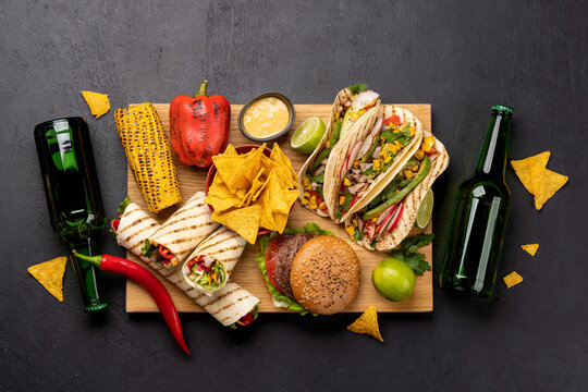Mexican food featuring tacos, burritos, nachos, burgers