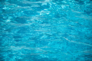 Water in swimming pool, background with high resolution. Wave abstract or rippled water texture.