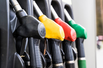 gas station. Pistols with gasoline and diesel fuel at a car gas station. Oil business and...