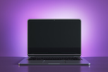 Creative purple designer workplace with empty black mock up laptop monitor. 3D Rendering.